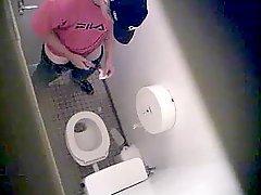 Cute gay masturbating in the toilet