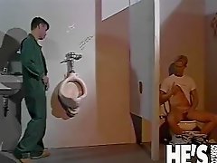 Blonde guy is taking a shit on the toilet and playing with his cock...