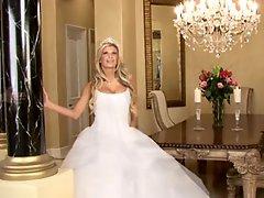 Bride in beautiful wedding dress spreading legs