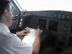 French stewardess exposes her big tits in the cockpit