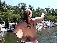Amateur sluts in swimsuits gladly flash at a lake party
