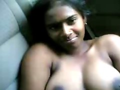 Tamil girl in car with her bf showing her sexy tits