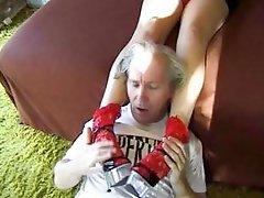 European college teen gives an old perv a naughty foot job