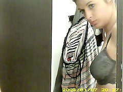 Dressing room hidden cam - Topless brunette with nice boobs