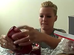 Sweet blonde Sophie Moone continues examining her presents