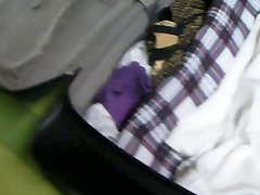Sneek Peek in Her Suitcase