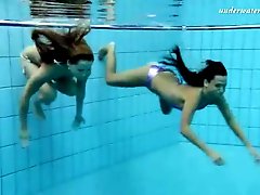 Girls tear off their bikinis underwater
