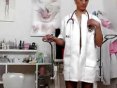 Nasty head nurse Rozi fingers her amazing piss hole