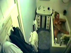 My cute mom masturbates in bath tube. Hidden cam
