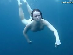 Three ladies get naked swimming in the ocean