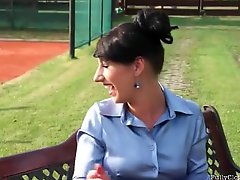 Tennis players blown by babe in satin blouse