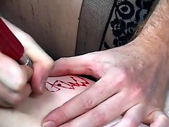 BDSM goth chick with three hair colors gets markings cut into her leg by stud