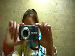 Pissing on disco toilet before camera