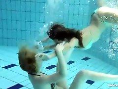 Bikini girls strip naked and play in the pool