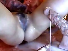 Hot oriental girl tasting tentacle semen after semen shot