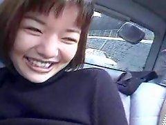 Two Japanese Girls in a Car