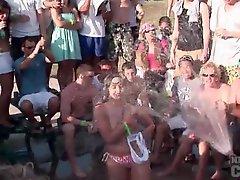 Babes get wet and topless at a Spring Break party