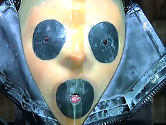 Tight black rubber mask makes Kristine Andrews suffocate and cry