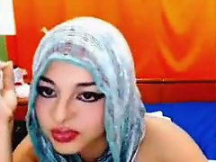 Webcam Pakistani brunette flashes big tits and rubs her hairy pussy