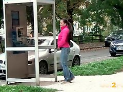 Pretty girl taking a piss on a public street