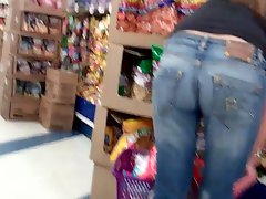 Butt &amp; ass in blue jeans shopping