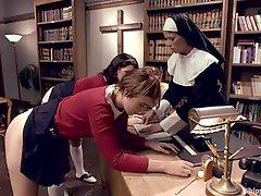 Nasty nun punishes and dominates two babes in school uniform
