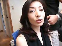 Horny asian MILF takes a thick dildo into her hairy pussy