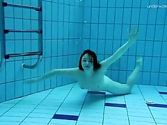 Big teen breasts bounce under the water