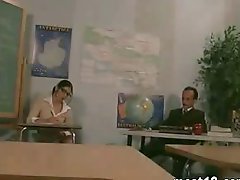 Nasty teacher destroying a teens tight pink pussy in the classroom