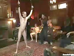 Everybody is watching and cuming on the tied up big cock puppy