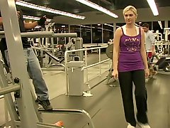 Lewd blonde Alison Angel flashes her natural boobs in a gym