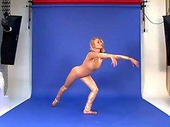 Shiny spandex bodysuit on a sexy flexible girl