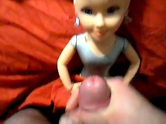 Sexy Blonde Doll In Pigtails Takes a Big Facial Cumshot
