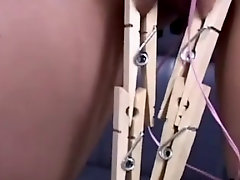 Pussy pegged and electro toy orgasms for Asian babe in dungeon BDSM session