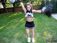 Brunette babe cheerleading and cock teasing by the pool