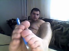 Cute turkish guy showing his feet on webcam
