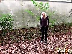 Small tits blonde cutie caught pissing outdoors