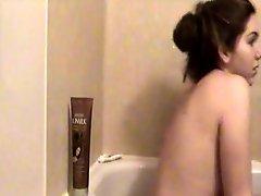 Curvy webcam girl with sexy areolas takes a bath